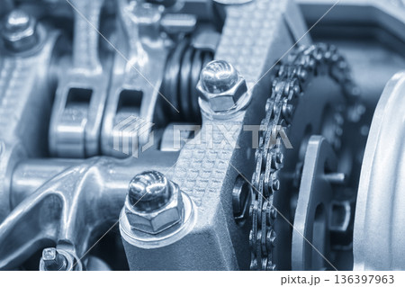 Close Up of Automotive Cylinder Head Parts in Light Blue Industrial Scene 136397963