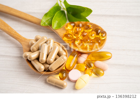Alternative medicine herbal organic capsule drug herb. 136398212