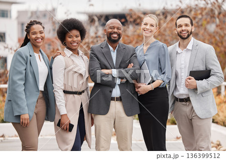 Team, portrait and business people with arms crossed in the city for corporate teamwork and diversity. Smile, together and a group of employees with pride, trust and professional solidarity for work 136399512