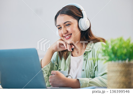 Laptop, education and headphones with woman in home office for elearning, study and blog. Digital, online class and college with female student and research for streaming, virtual and subscription Laptop, education and headphones with woman in home office for elearning, study and blog. Digital, online class and college with female student and research for streaming, virtual and subscription 136399546