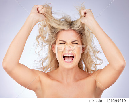 Messy hair, woman shout and frustrated with beauty, problem and salon hairstyle disaster on white background. Haircare stress, female model screaming and angry, treatment fail and damage in studio Messy hair, woman shout and frustrated with beauty, problem and salon hairstyle disaster on white background. Haircare stress, female model screaming and angry, treatment fail and damage in studio 136399610
