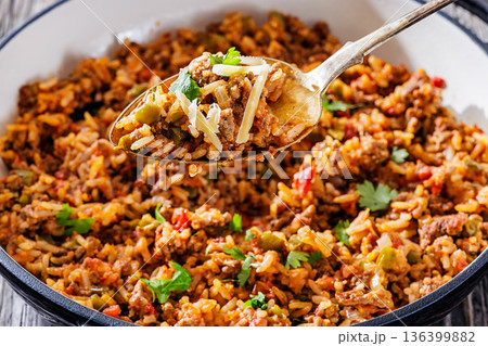 Texas hash of beef pepper onion tomato and rice Texas hash of beef pepper onion tomato and rice 136399882