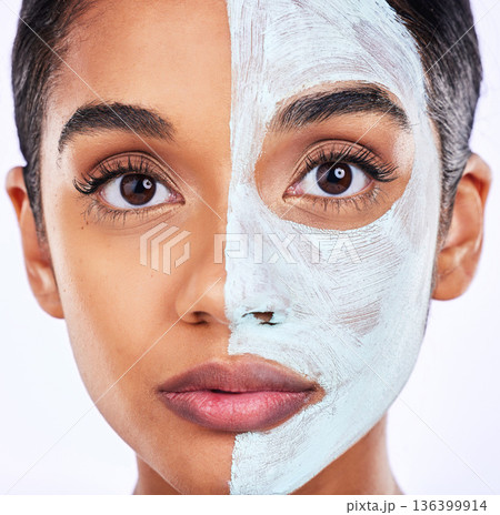 Skincare, portrait and woman in studio with facial, half and cosmetic treatment or dermatology. Face, mask and Indian female wellness model with cream, comparison or result, beauty and satisfaction 136399914