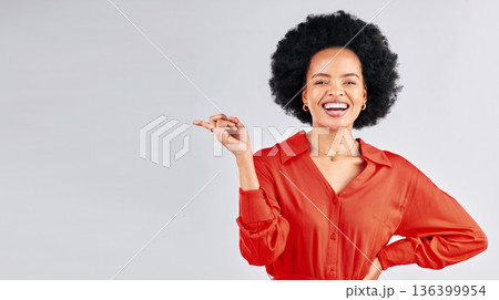 Portrait, pointing and black woman mockup, smile and promotion against a white studio background. Face, female person and model with hand gesture, showing and choice with presentation and opportunity 136399954