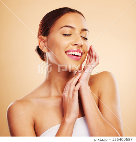 Relax, smile or natural face of happy woman in studio isolated on brown background for skincare. Facial treatment, beauty grooming or zen girl model relaxing with glow, shine or self care cosmetics Relax, smile or natural face of happy woman in studio isolated on brown background for skincare. Facial treatment, beauty grooming or zen girl model relaxing with glow, shine or self care cosmetics 136400687