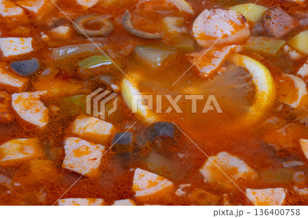 Hearty smoky soup paired with tangy lemon meat and rustic smoky flavors, Robust smoky broth complemented by zesty lemoninfused meat and elegant rustic smoky essence of dish Hearty smoky soup paired with tangy lemon meat and rustic smoky flavors, Robust smoky broth complemented by zesty lemoninfused meat and elegant rustic smoky essence of dish 136400758