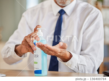 Hands, bottle and sanitizer for business man, cleaning and stop virus for health, wellness or hygiene in office. Professional person, entrepreneur or employee with product, gel or liquid for bacteria 136400784