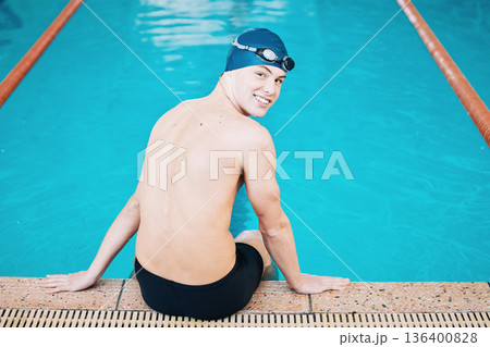 Swimming, sports and portrait of happy man by pool for training, competition and exercise in gym. Professional, fitness and male swimmer ready for challenge, workout and start practice for wellness 136400828