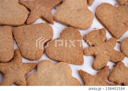 Holiday sweet delights, Decorative ginger cookies crafted creatively for holiday festivities, Sweet and spicy homemade cookies shaped in unique designs for celebration events 136401584