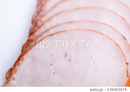 Mealprep ham slices ready for lunchboxes, neatly arranged thin rounds showing consistent cut and texture, practical option for quick meal planning and fridge storage Mealprep ham slices ready for lunchboxes, neatly arranged thin rounds showing consistent cut and texture, practical option for quick meal planning and fridge storage 136401674