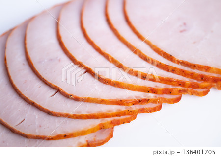 Consistent sliced turkey layout for menus. Precisely spaced turkey slices on white backdrop with high lighting emphasizing clean edges for catalog and menu layouts Consistent sliced turkey layout for menus. Precisely spaced turkey slices on white backdrop with high lighting emphasizing clean edges for catalog and menu layouts 136401705