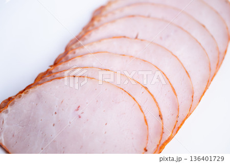Warm tones for picnic arrangement. Rustic ham slices tailored for social platter. Relaxed picnic setup featuring ham slices styled for sharing on casual outdoor snack board Warm tones for picnic arrangement. Rustic ham slices tailored for social platter. Relaxed picnic setup featuring ham slices styled for sharing on casual outdoor snack board 136401729