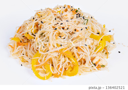 Fresh rice vermicelli salad with yellow pepper, herbs and sesame sprinkle, light dressing and bright daylight, nutritious weekday lunch option and mealprep idea Fresh rice vermicelli salad with yellow pepper, herbs and sesame sprinkle, light dressing and bright daylight, nutritious weekday lunch option and mealprep idea 136402521