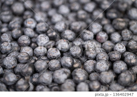 Healthy snack with fresh berries. Natural blueberries ideal for health visuals. Vibrant fresh blueberries suitable for promoting healthy eating and lifestyle content Healthy snack with fresh berries. Natural blueberries ideal for health visuals. Vibrant fresh blueberries suitable for promoting healthy eating and lifestyle content 136402947
