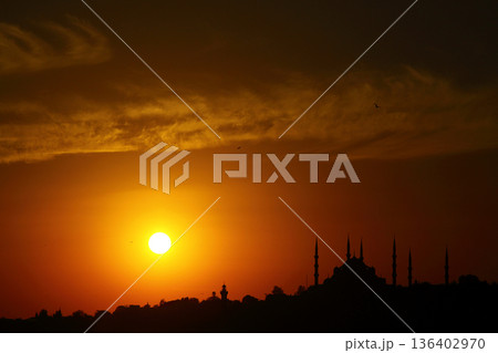 Sillhouette of Istanbul at sunset.  Ramadan time with the muslim city istanbul silhouette 136402970