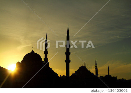Sillhouette of Istanbul at sunset.  Ramadan time with the muslim city istanbul silhouette 136403001