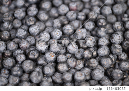 Healthy berries stand out. Vivid berries accentuate nutritious meal selection. Juicy clusters of berries represent nutritious and plantbased meal option to start day 136403085