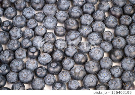 Blueberries breakfast ambiance. Juicy blueberries evoke calm breakfast smoothie vibe. Colorful clusters of blueberries generate vibrant and soothing breakfast environment 136403199