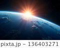 宇宙から望む地球の夜明けと強烈な太陽光 ai 136403271