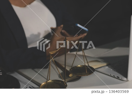 Businesswoman and Male lawyer or judge consult and conference having team meeting with client at law firm in office, Law and Legal services concept Businesswoman and Male lawyer or judge consult and conference having team meeting with client at law firm in office, Law and Legal services concept 136403569