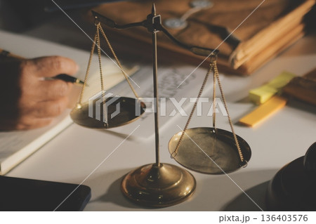 Businesswoman and Male lawyer or judge consult and conference having team meeting with client at law firm in office, Law and Legal services concept 136403576