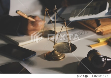 Businesswoman and Male lawyer or judge consult and conference having team meeting with client at law firm in office, Law and Legal services concept Businesswoman and Male lawyer or judge consult and conference having team meeting with client at law firm in office, Law and Legal services concept 136403577