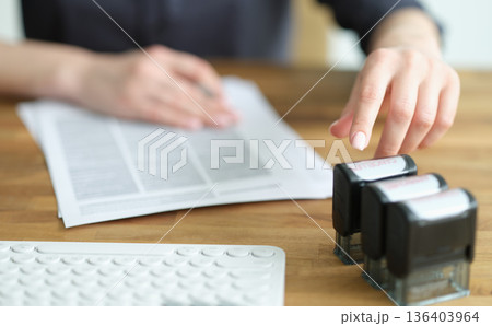 Creating documents with attention to detail during a busy office morning Creating documents with attention to detail during a busy office morning 136403964