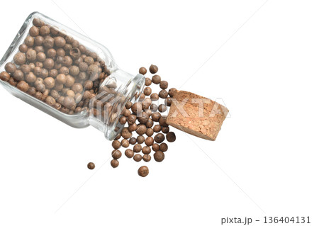 Allspice peas in a square bottle. 136404131
