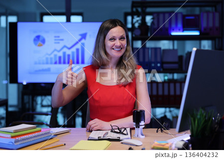 Celebrating success in a modern office with streamlined data and positive energy Celebrating success in a modern office with streamlined data and positive energy 136404232