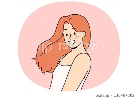 Attractive woman with freckles on face smiles and looks at screen demonstrating natural beauty Attractive woman with freckles on face smiles and looks at screen demonstrating natural beauty 136407302