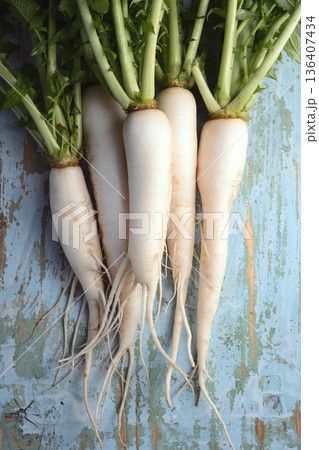 Raw daikon radish on vintage blue wooden surface 136407434