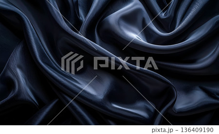 黒いサテン生地の滑らかなドレープ ／ 高級感と静けさを演出する抽象背景素材 136409190