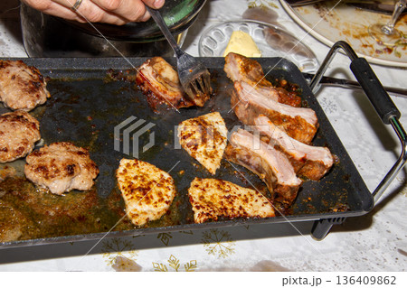 A gourmet sheet pan with crispy meat A gourmet sheet pan with crispy meat 136409862