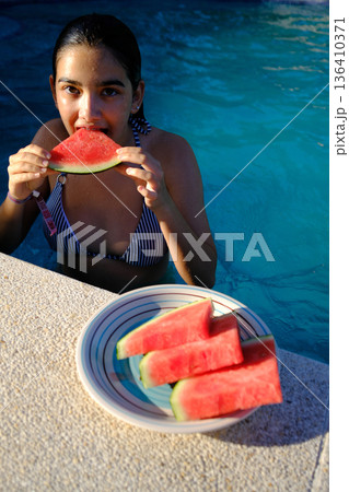 Natural portrait of a teenage girl around 13 to 14 years old. The image captures youthful expression, innocence, and personal identity. Ideal for themes like adolescence, education, lifestyle, emotion 136410371