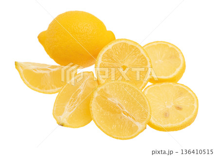 Yellow ripe lemons whole and cut isolated on white. Citrus fruit, lemon. 136410515