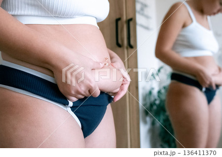 Curvy body. Natural skin texture close up. Real body concept Curvy body. Natural skin texture close up. Real body concept 136411370