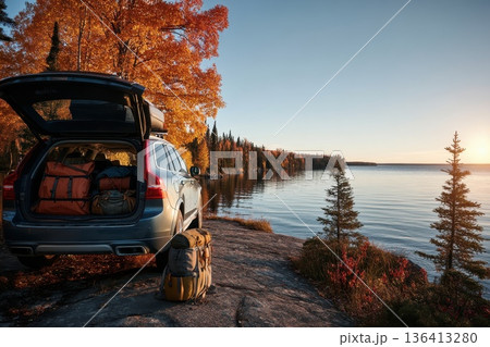 Scenic SUV Adventure at Lakeside with Camping Gear in Autumn Landscape Scenic SUV Adventure at Lakeside with Camping Gear in Autumn Landscape 136413280