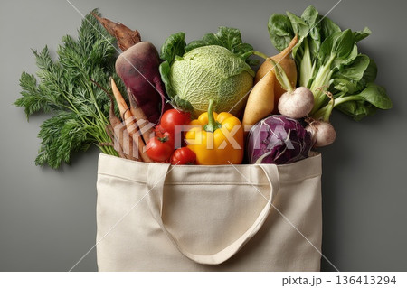 Fresh Vegetables in Eco-Friendly Single Reusable Shopping Bag on Gray Background Fresh Vegetables in Eco-Friendly Single Reusable Shopping Bag on Gray Background 136413294