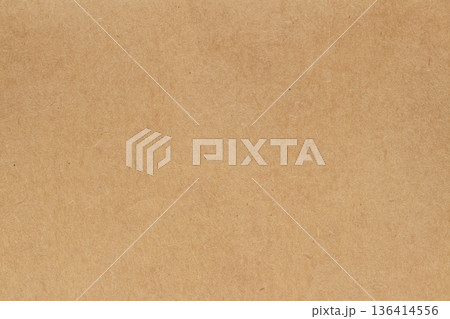 Brown cardboard sheet abstract background, texture of sepia color kraft paper with vintage pattern for design art work. 136414556