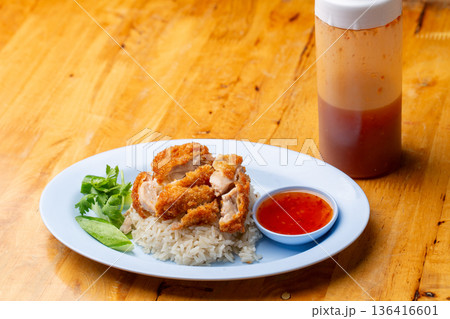 Thai Hainanese Chicken Rice with Crispy Chicken and Dipping Sauce 136416601