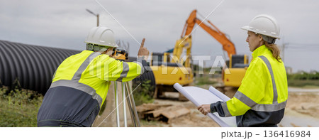 Engineer survey team checking construction project inspection work construction site . Engineer survey team checking construction project inspection work construction site . 136416984