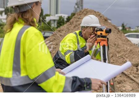 Engineer survey team checking construction project  inspection work construction site . 136416989