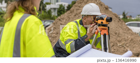 Engineer survey team checking construction project inspection work construction site . Engineer survey team checking construction project inspection work construction site . 136416990