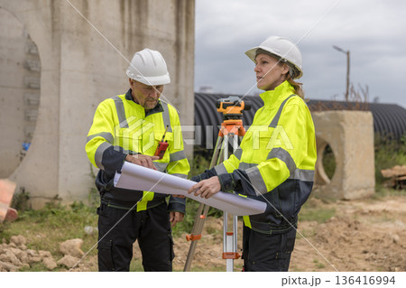 Engineer survey team checking construction project  inspection work construction site . 136416994