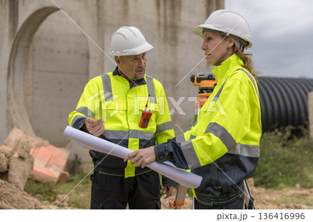 Engineer survey team checking construction project inspection work construction site . Engineer survey team checking construction project inspection work construction site . 136416996