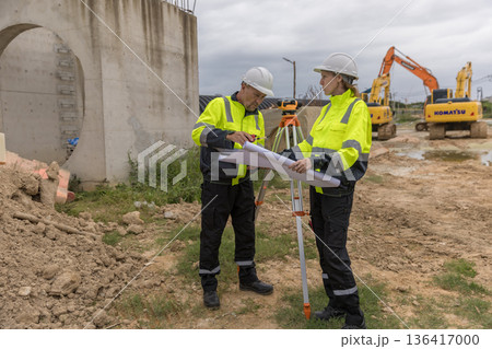 Engineer survey team checking construction project  inspection work construction site . 136417000