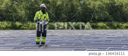 Engineer Checking and working setup Floating solar panels or solar cell Platform system on the lake. Engineer Checking and working setup Floating solar panels or solar cell Platform system on the lake. 136418111