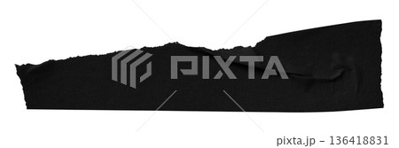 black crumpled torn tape isolated on transparent background. black crumpled torn tape isolated on transparent background. 136418831