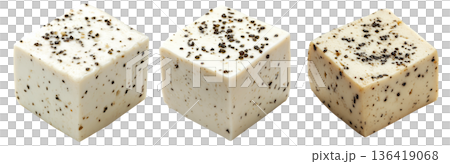 Cubes of seasoned tofu with visible herbs and spices, arranged in stack isolated on white transparent background 136419068