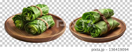 Set of Lu Pulu beef wraps filled with coconut cream in taro leaves on wooden plate, isolated on white transparent background 136419094